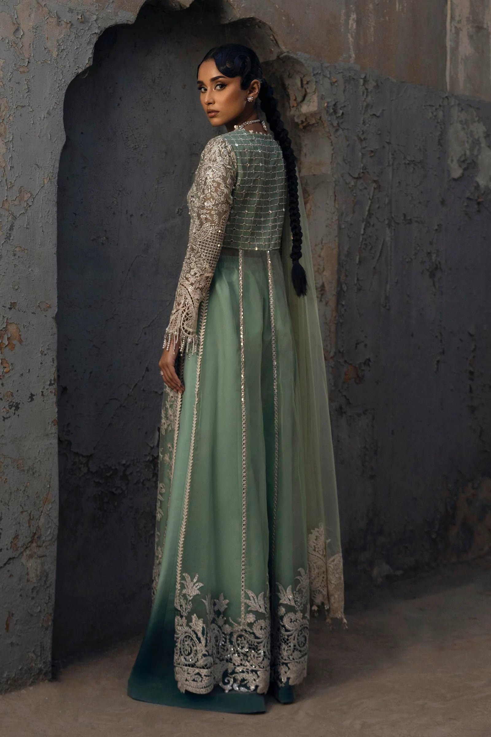 Model wearing mint green Sana Safinaz N251-005-3CX heavily embroidered gown with mirror work, Pakistani Luxury pret, Pakistani clothes online in UK.