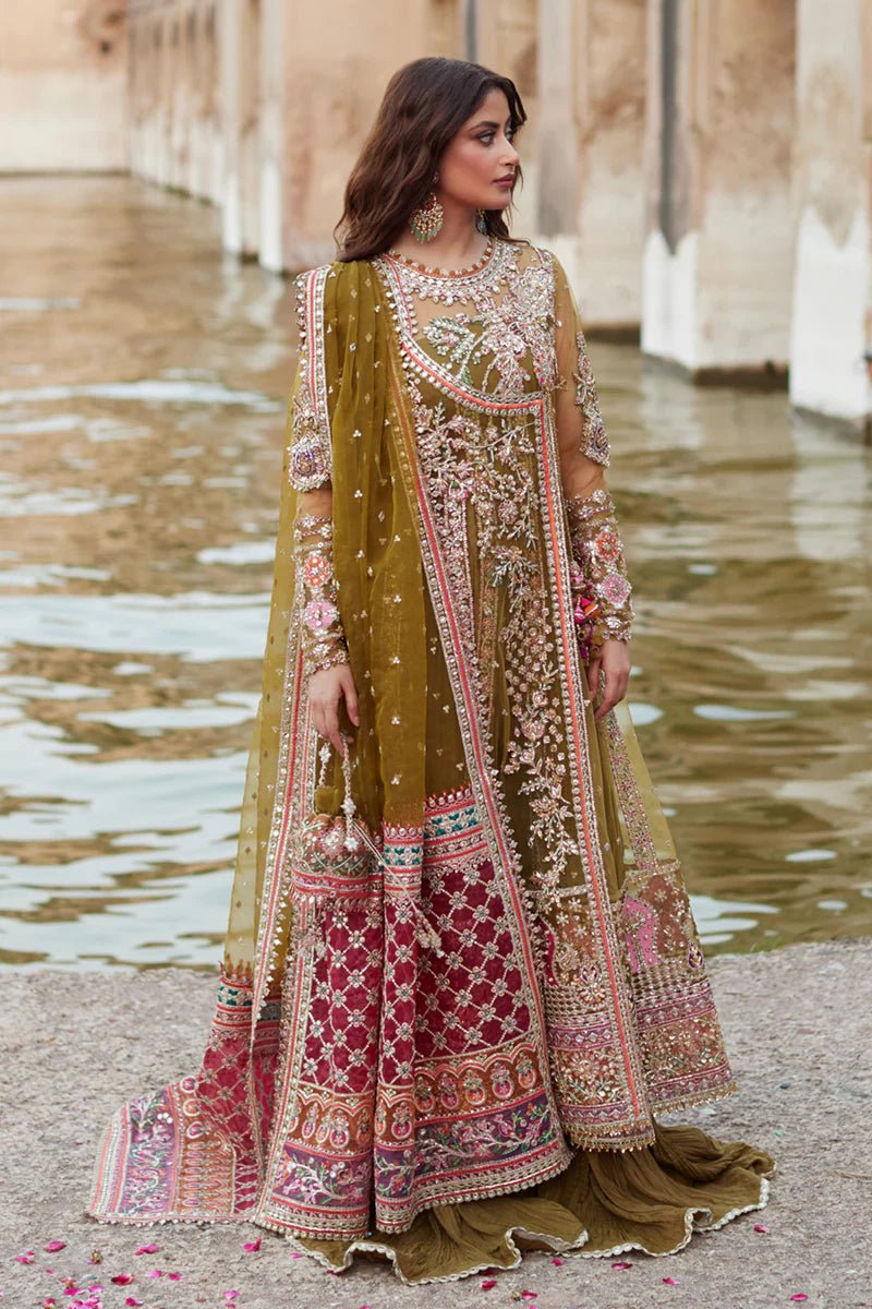 Model wearing Qalamkaar Shadmani Luxury Formals '24 Rameesha SH - 01 dress in olive green and deep red with intricate embroidery. Shop Pakistani bridal dresses online in the UK now.