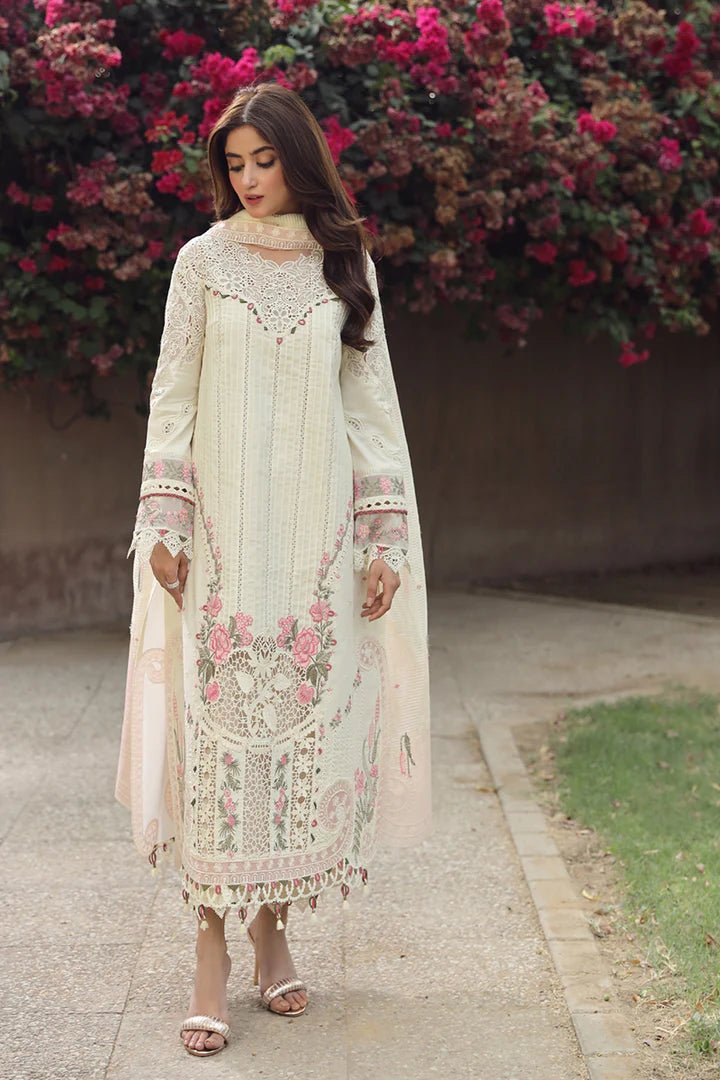 Model showcasing exquisite AMAAR dress by Qalamkar, perfect for Eid celebrations. Shop Pakistani lawn dresses in the UK!