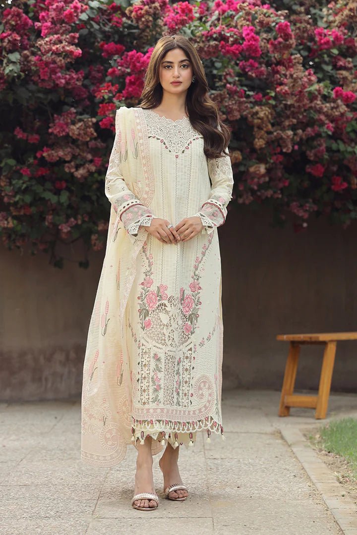 Model showcasing exquisite AMAAR dress by Qalamkar, perfect for Eid celebrations. Shop Pakistani lawn dresses in the UK!