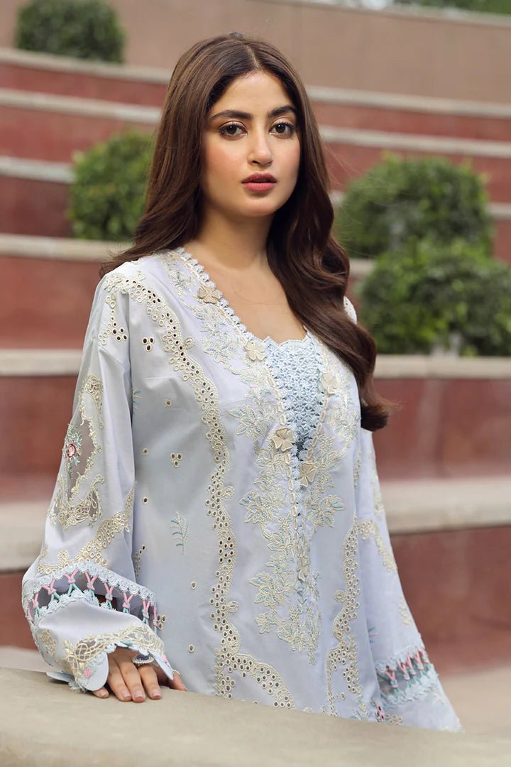 Model wearing elegant ZAIB dress by Qalamkar, showcasing Pakistani lawn attire for Eid. Get festive Pakistani clothes in the UK!