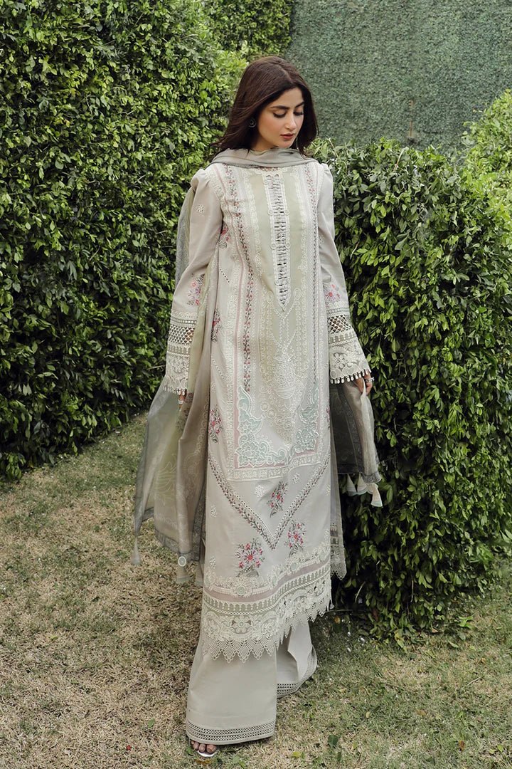 Model wearing Qalamkar PS - 11 Rinnah dress in bright pink, featuring intricate white embroidery, ideal for Pakistani lawn dresses and Eid clothes in the UK.