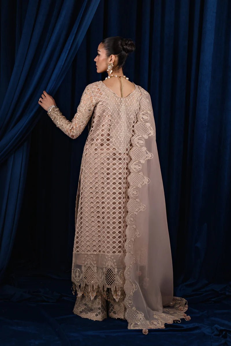 Model wearing Qalamkar Luxe Pret CR - 02 MARIYA dress, highlighting elegant Pakistani clothes online in the UK.