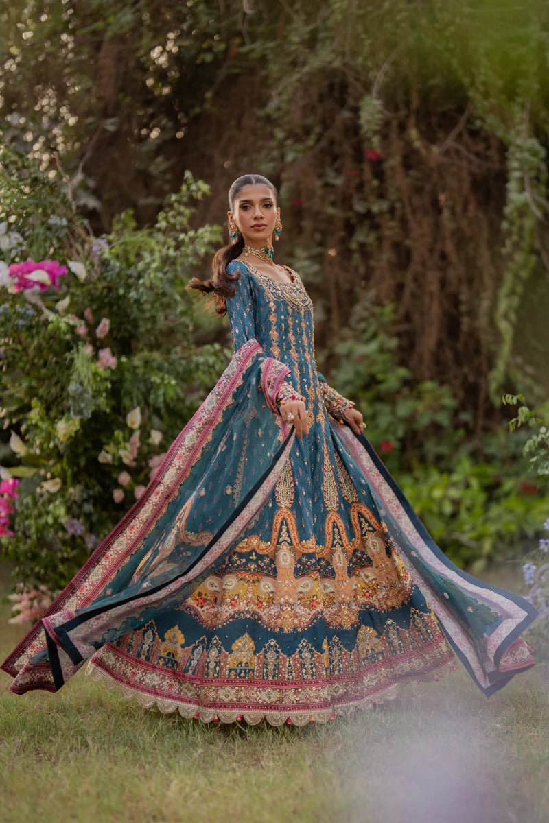 Model wearing UA - 09 TINA from Qalamkar's Luxe Silk '24, featuring a luxurious silk design. Pakistani clothes online in UK.