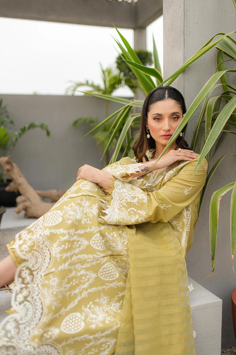 Model wearing Qalamkar Qline Lawn Collection '24 JK - 02 MELIS dress, showcasing Pakistani clothes online in the UK.