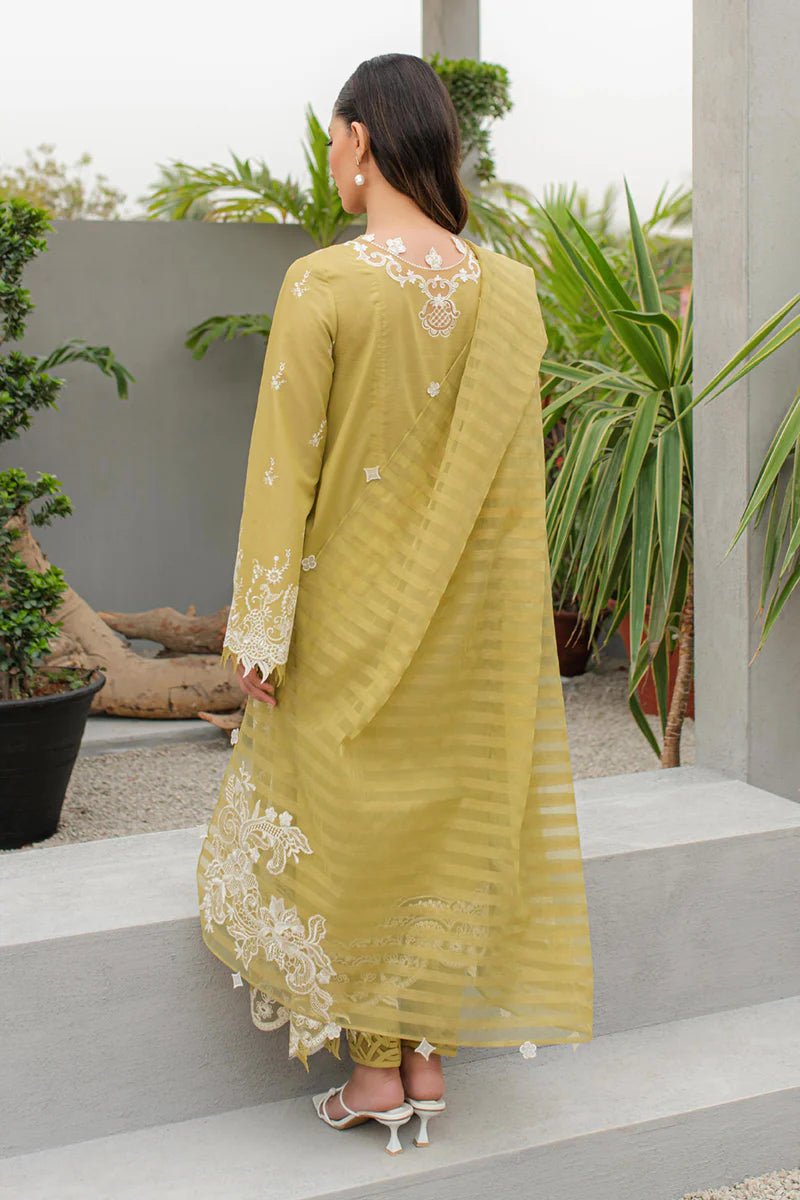 Model wearing Qalamkar Qline Lawn Collection '24 JK - 02 MELIS dress, showcasing Pakistani clothes online in the UK.