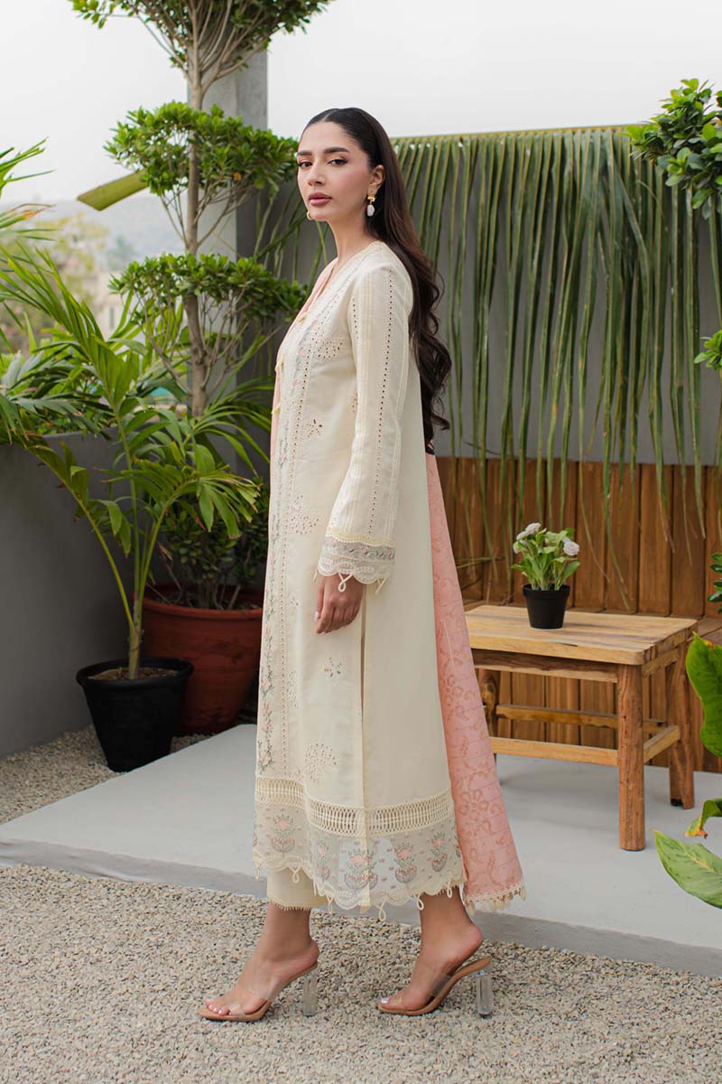 Model wearing Qalamkar Qline Lawn Collection '24 JK - 05 MELIORA dress, a vibrant choice for Pakistani clothes online in the UK.