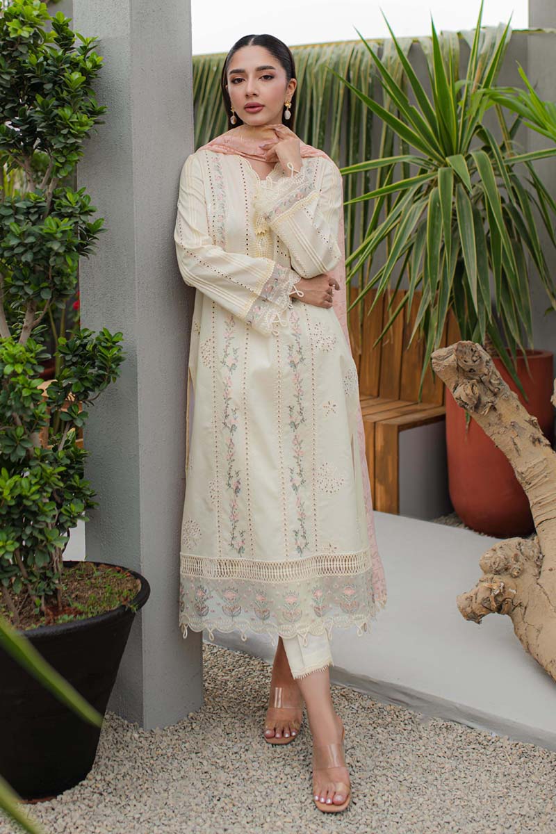 Model wearing Qalamkar Qline Lawn Collection '24 JK - 05 MELIORA dress, a vibrant choice for Pakistani clothes online in the UK.