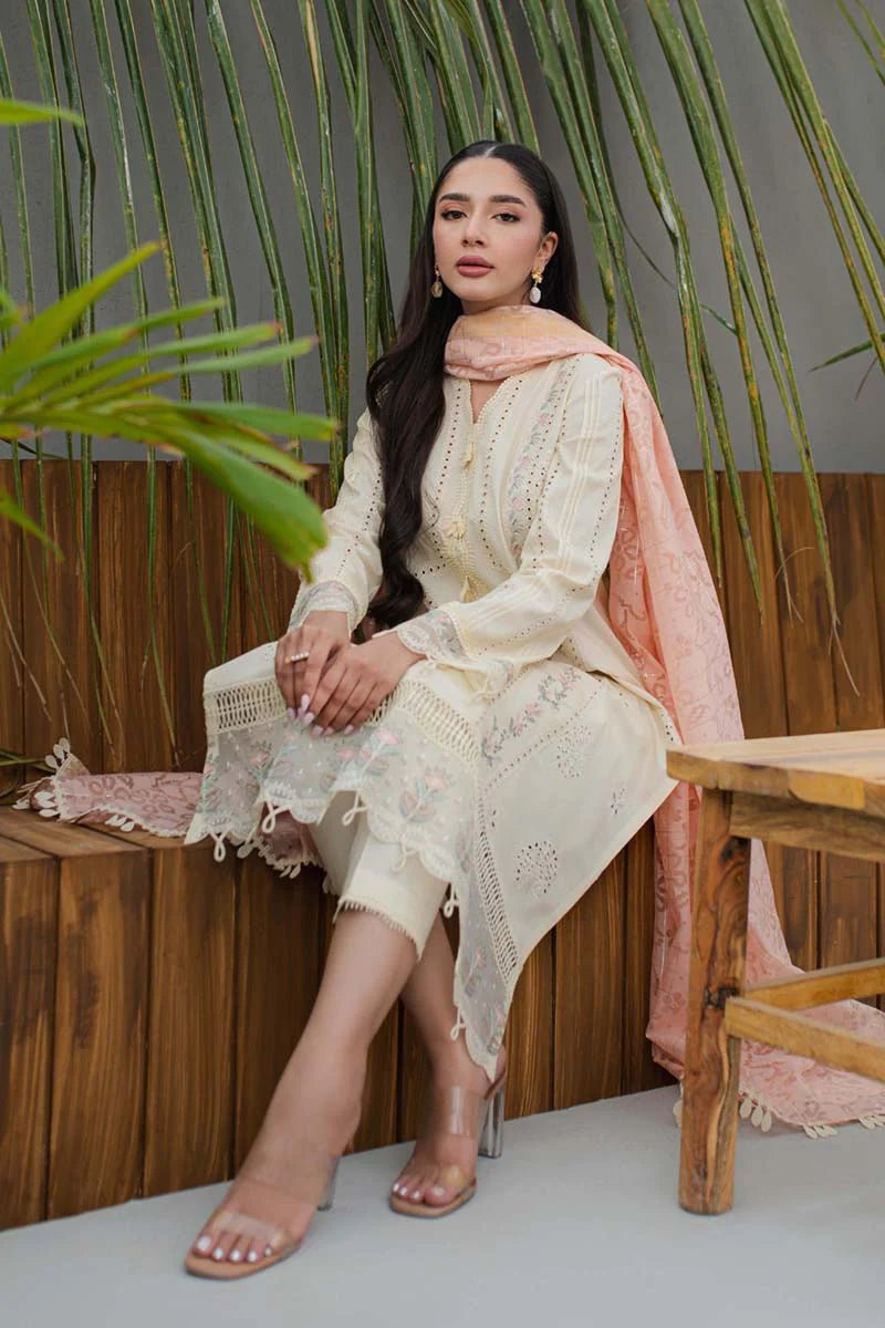 Model wearing Qalamkar Qline Lawn Collection '24 JK - 05 MELIORA dress, a vibrant choice for Pakistani clothes online in the UK.