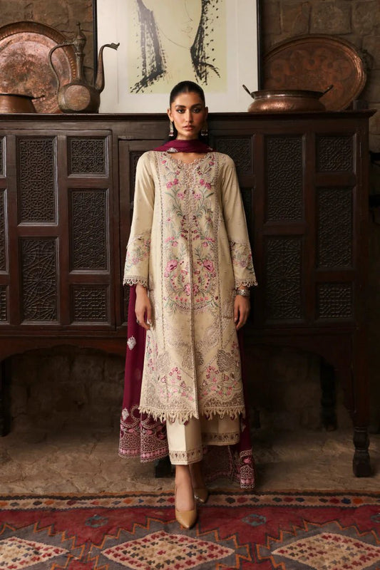 Model wearing LM - 01 FAYE dress from Qalamkar's Qlinekari Linen collection in cream with floral embroidery and maroon dupatta. Pakistani winter casual pret available online in the UK.