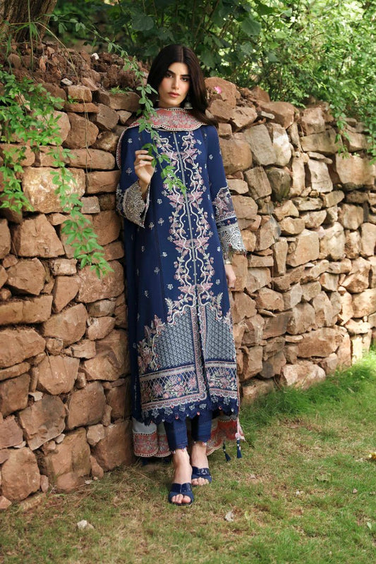 Model wearing LM - 06 CADHLA dress from Qalamkar's Qlinekari Linen collection in deep blue with intricate embroidery. Pakistani winter casual pret available online in the UK.