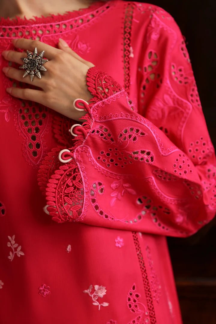 Model wearing LM - 07 NEESA dress from Qalamkar's Qlinekari Linen collection in vibrant red. Pakistani winter casual pret available online in the UK.