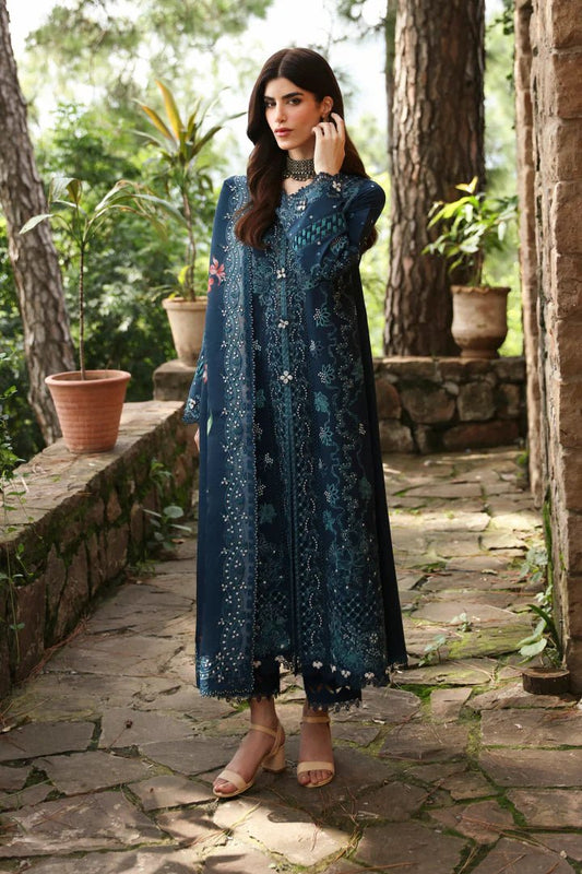 Model wearing LM - 10 TULA dress from Qalamkar's Qlinekari Linen collection in deep blue. Pakistani winter casual pret available online in the UK.