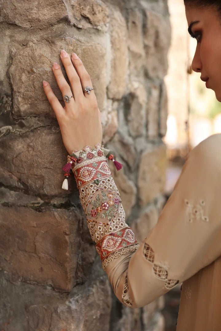 Model wearing LM - 11 ZIA dress from Qalamkar's Qlinekari Linen collection in beige. Pakistani winter casual pret available online in the UK.