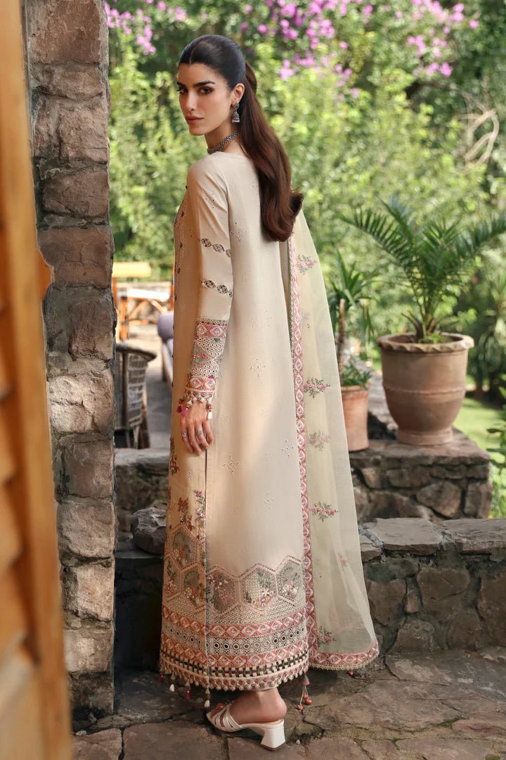 Model wearing LM - 11 ZIA dress from Qalamkar's Qlinekari Linen collection in beige. Pakistani winter casual pret available online in the UK.