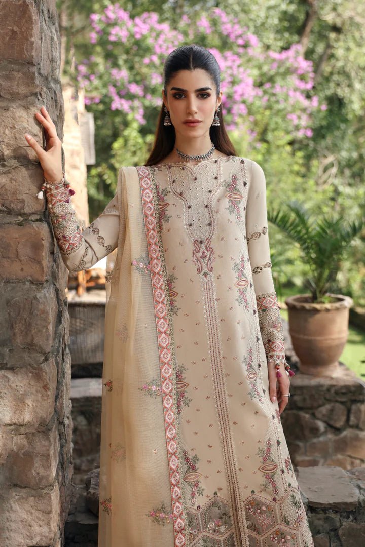 Model wearing LM - 11 ZIA dress from Qalamkar's Qlinekari Linen collection in beige. Pakistani winter casual pret available online in the UK.