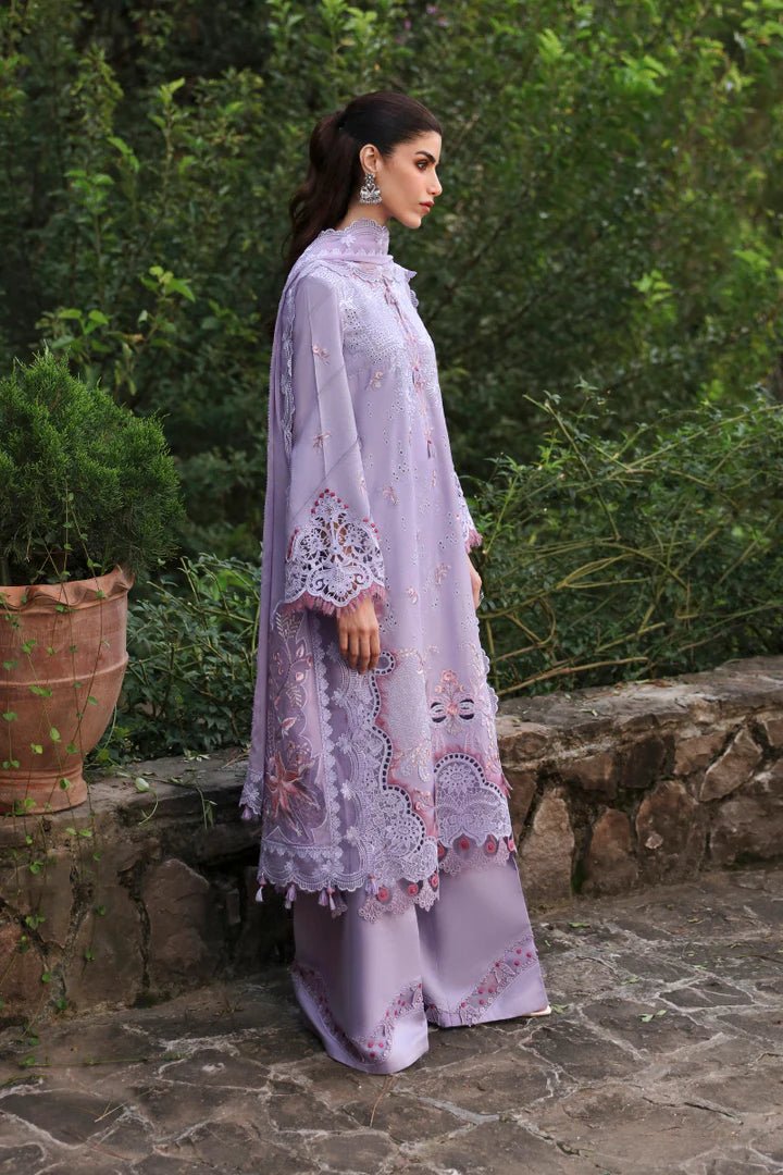 Model wearing LM - 14 MAEVE dress from Qalamkar's Qlinekari Linen collection in lavender. Pakistani winter casual pret available online in the UK.