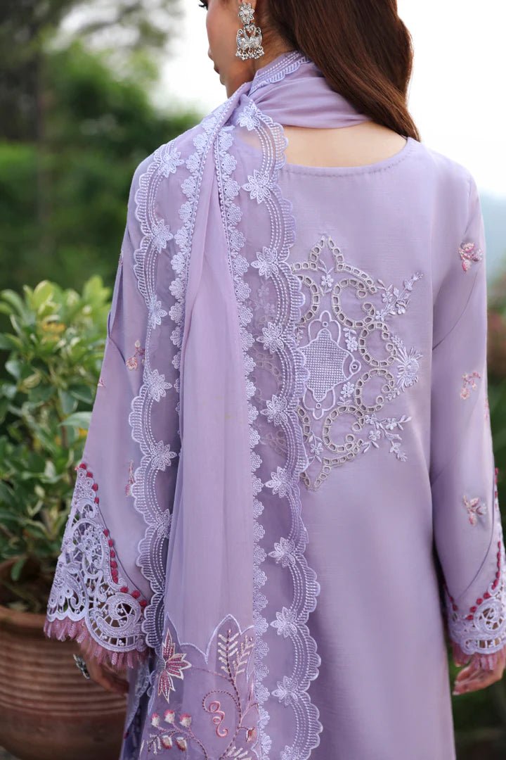 Model wearing LM - 14 MAEVE dress from Qalamkar's Qlinekari Linen collection in lavender. Pakistani winter casual pret available online in the UK.