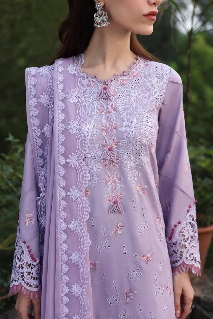 Model wearing LM - 14 MAEVE dress from Qalamkar's Qlinekari Linen collection in lavender. Pakistani winter casual pret available online in the UK.