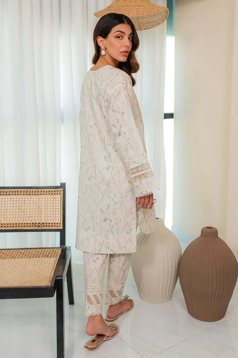 Model wearing Qalamkar Qprints 24 DP - 01 INES dress, presenting Pakistani fashion online in the UK.