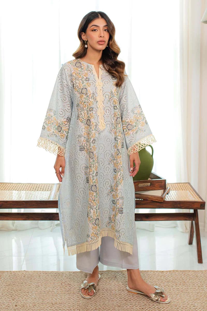 Model wearing LEA dress from Qalamkar Qprints 24, a blend of tradition and fashion in Pakistani clothes UK.