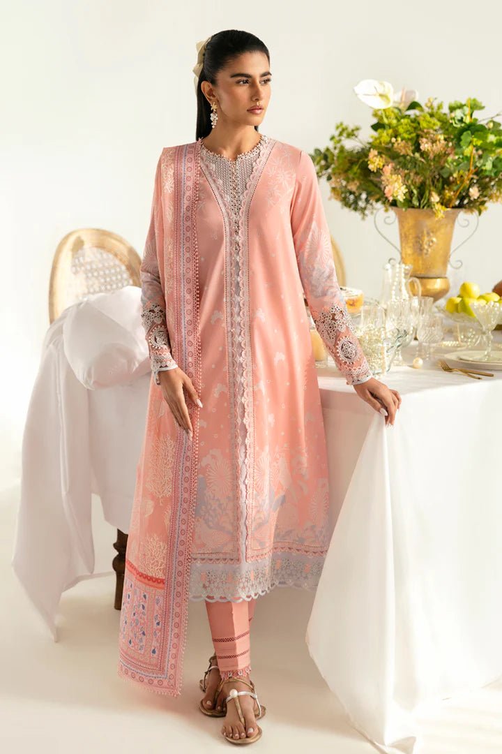 Model wearing peach PQ - 02 Aroha dress from Qalamkar, a stylish Pakistani lawn suit perfect for summer clothes in the UK.
