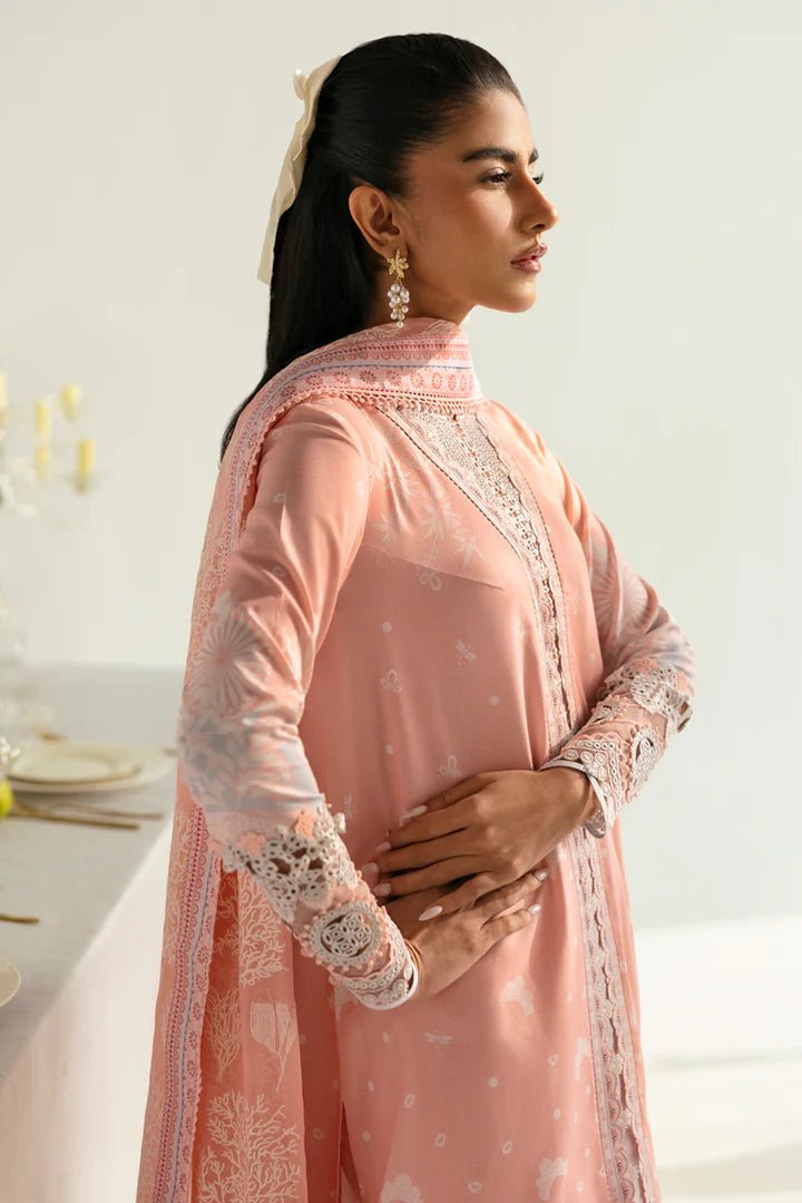 Model wearing peach PQ - 02 Aroha dress from Qalamkar, a stylish Pakistani lawn suit perfect for summer clothes in the UK.