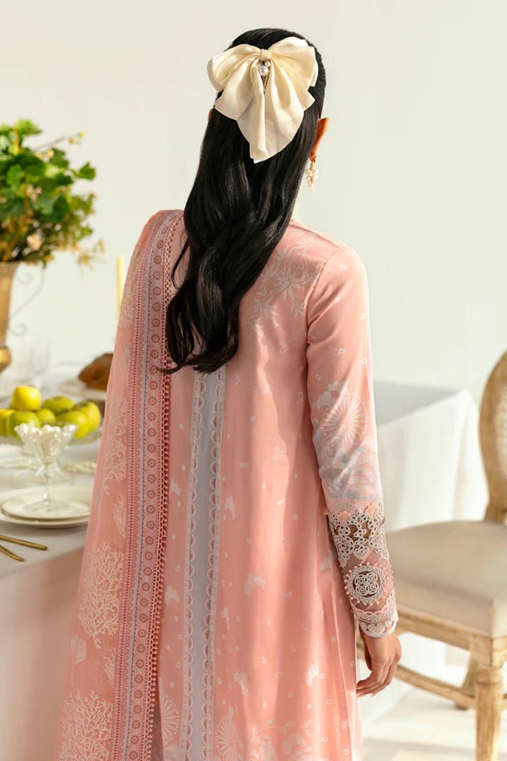 Model wearing peach PQ - 02 Aroha dress from Qalamkar, a stylish Pakistani lawn suit perfect for summer clothes in the UK.