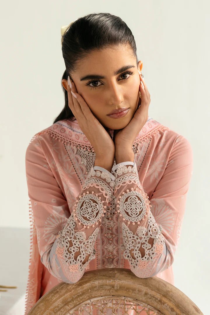 Model wearing peach PQ - 02 Aroha dress from Qalamkar, a stylish Pakistani lawn suit perfect for summer clothes in the UK.