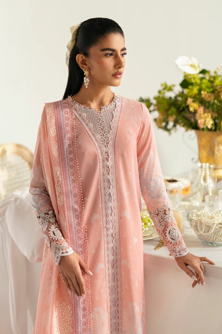 Model wearing peach PQ - 02 Aroha dress from Qalamkar, a stylish Pakistani lawn suit perfect for summer clothes in the UK.