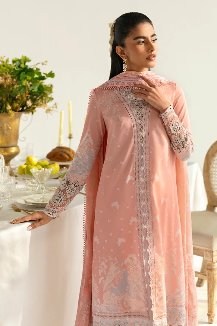 Model wearing peach PQ - 02 Aroha dress from Qalamkar, a stylish Pakistani lawn suit perfect for summer clothes in the UK.