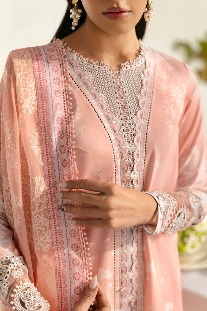 Model wearing peach PQ - 02 Aroha dress from Qalamkar, a stylish Pakistani lawn suit perfect for summer clothes in the UK.