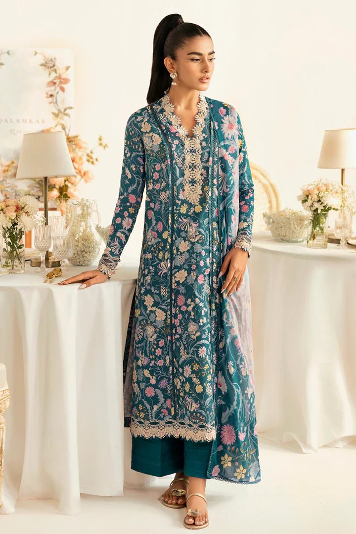 Model wearing teal PQ - 04 Rhea dress from Qalamkar, a stylish Pakistani lawn suit perfect for summer clothes in the UK.