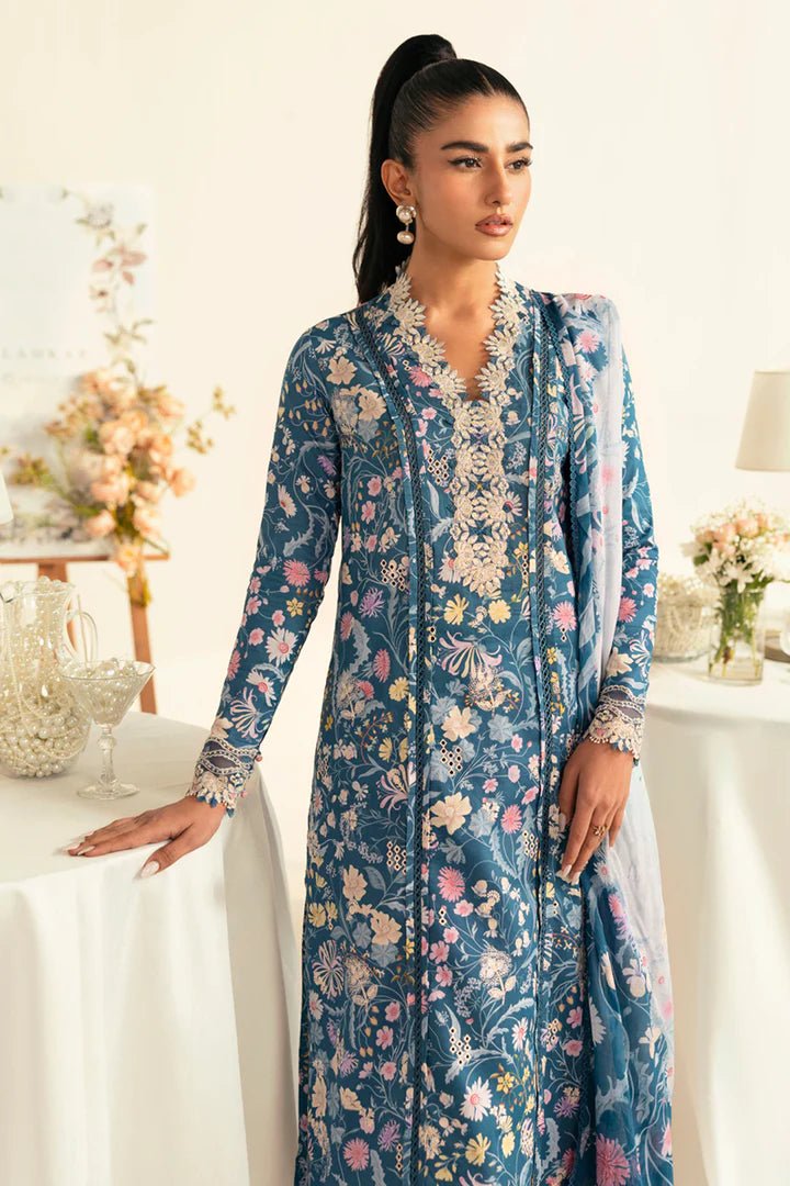 Model wearing teal PQ - 04 Rhea dress from Qalamkar, a stylish Pakistani lawn suit perfect for summer clothes in the UK.