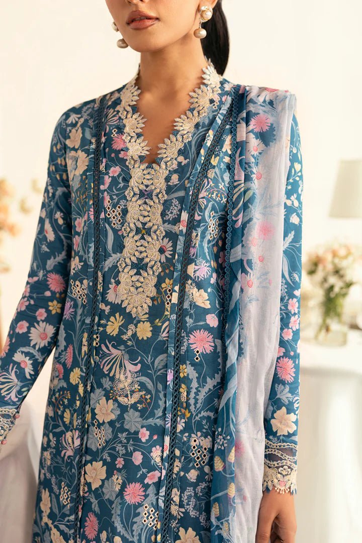 Model wearing teal PQ - 04 Rhea dress from Qalamkar, a stylish Pakistani lawn suit perfect for summer clothes in the UK.