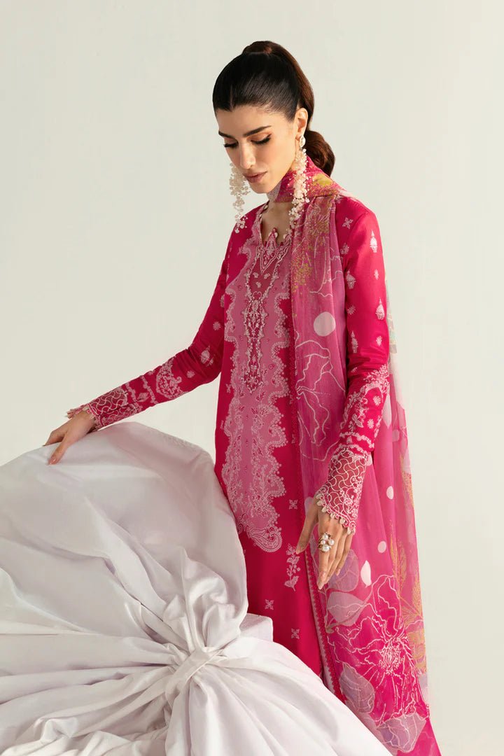 Model wearing pink PQ - 06 Veda dress from Qalamkar, a stylish Pakistani lawn suit perfect for summer clothes and lawn suits in the UK.