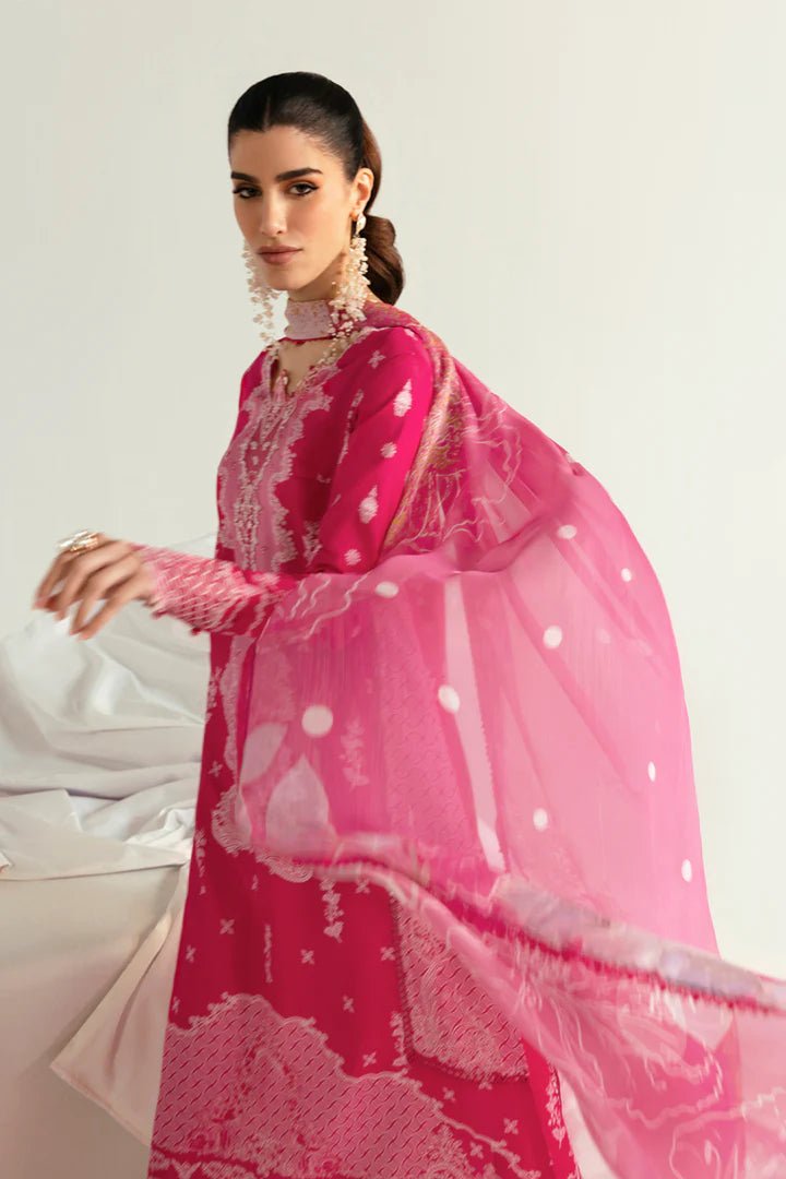 Model wearing pink PQ - 06 Veda dress from Qalamkar, a stylish Pakistani lawn suit perfect for summer clothes and lawn suits in the UK.