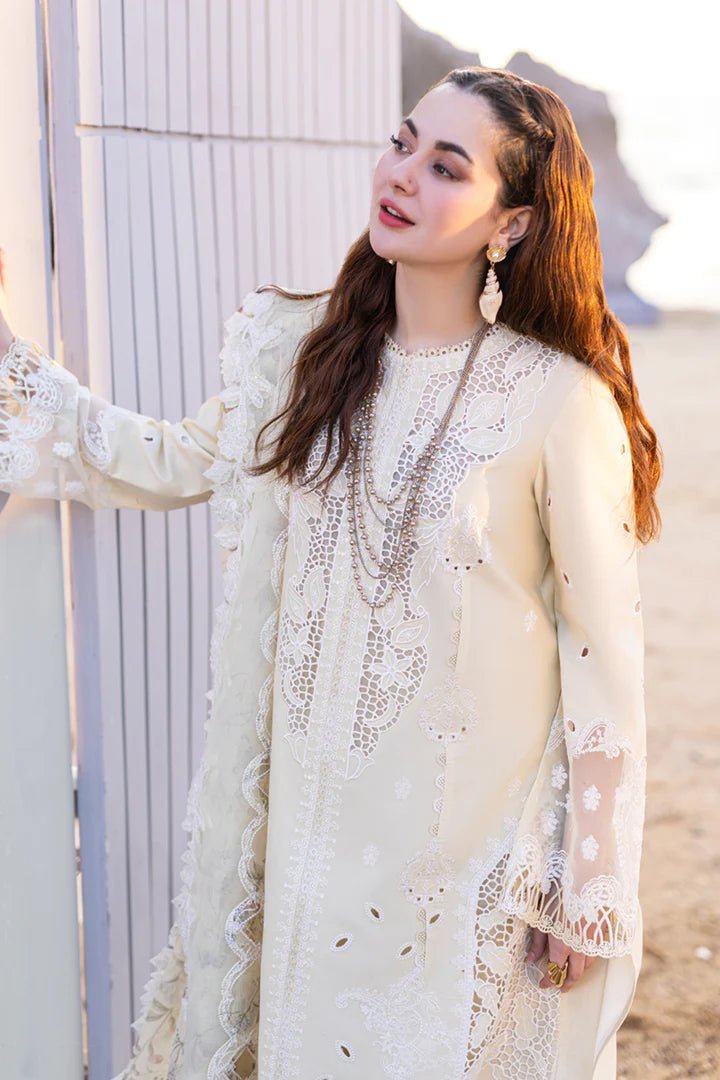 Model wearing cream FP - 01 JANA dress from Qalamkar's SAHIL KINARE Luxury Lawn ’24 collection. This image showcases Pakistani clothes online in the UK, ideal for lawn suits.