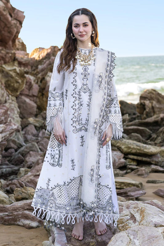 "Model in elegant Qalamkar UK FIZA white dress, traditional Pakistani lawn clothing for UK."