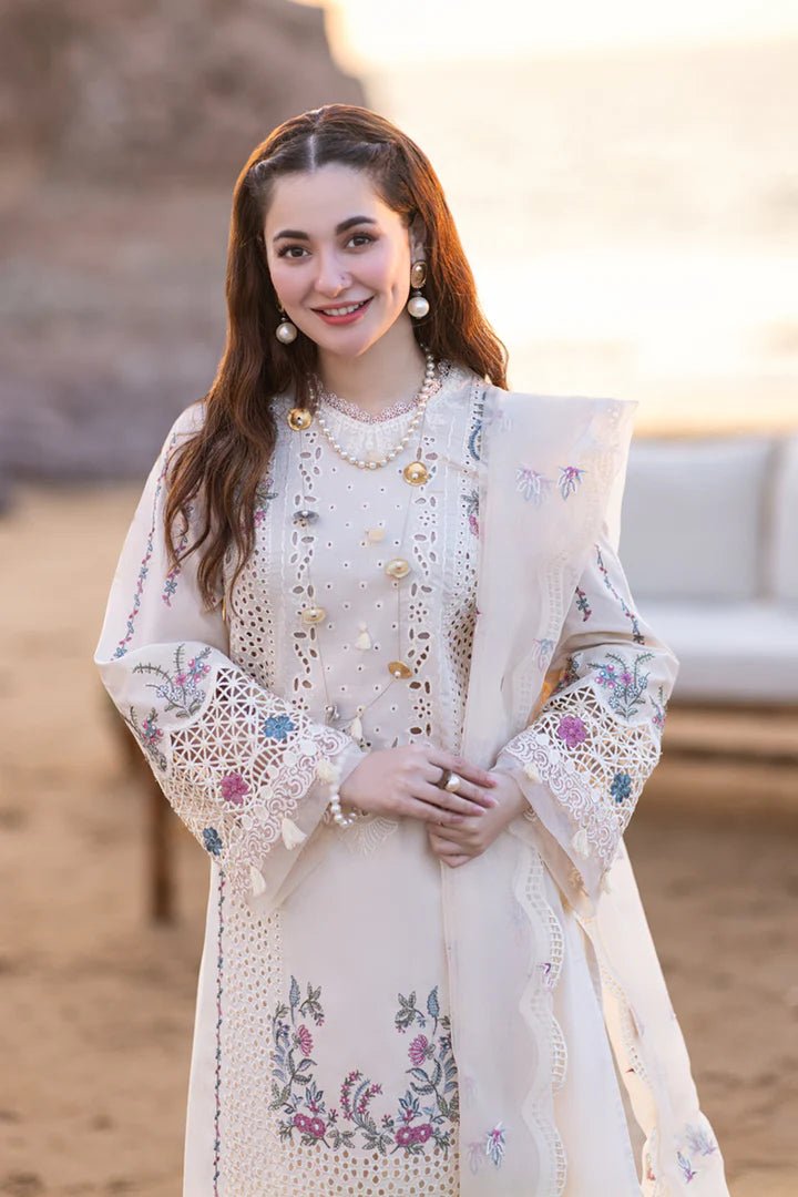 Model wearing a pastel pink FP - 09 SELIN dress from Qalamkar's SAHIL KINARE Luxury Lawn’24 collection. Perfect for Pakistani clothes online in the UK