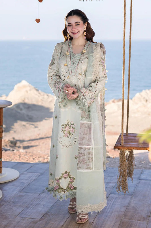 Model wearing pastel green lawn dress with floral embroidery and lace detailing from Qalamkar's SAHIL KINARE - Luxury Lawn’24 collection, FP - 15 RANIA. Perfect for showcasing Pakistani clothes online in UK