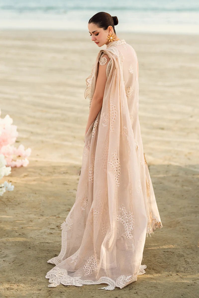 Model wearing Qalamkar Sahil Luxury Lawn '25 FK - 01 SOPHIA dress in soft beige with intricate embroidery. Shop Pakistani clothes online in the UK now.