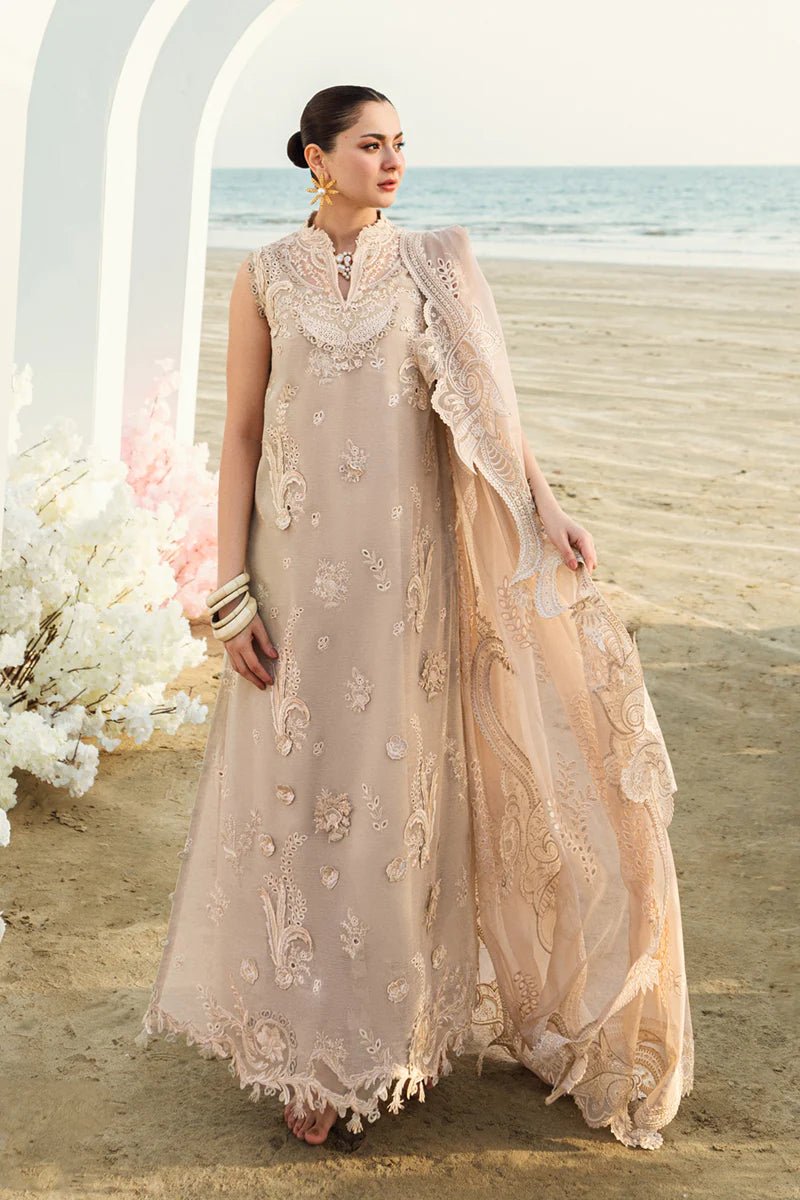 Model wearing Qalamkar Sahil Luxury Lawn '25 FK - 01 SOPHIA dress in soft beige with intricate embroidery. Shop Pakistani clothes online in the UK now.