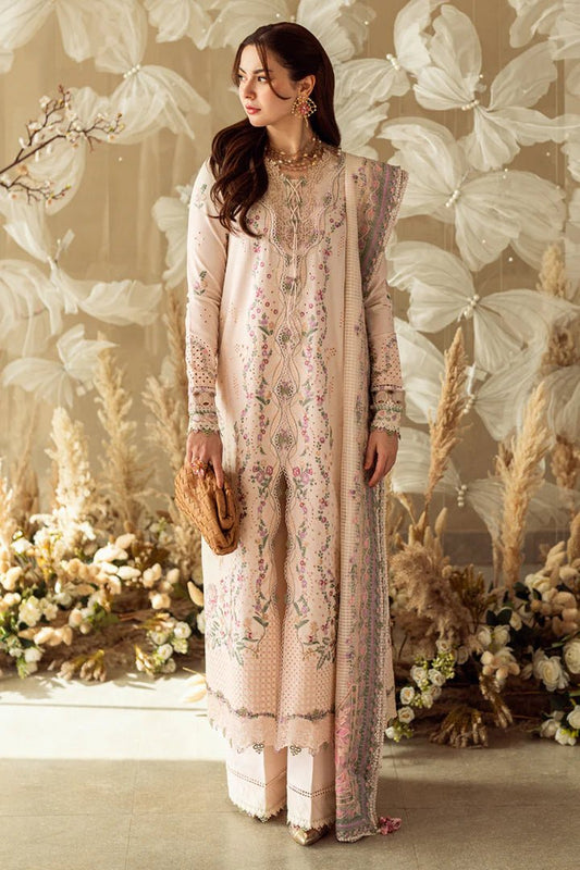 Model wearing pastel pink FK - 12 LILY dress from Qalamkar, a stylish Pakistani lawn suit perfect for summer clothes and lawn suits in the UK.