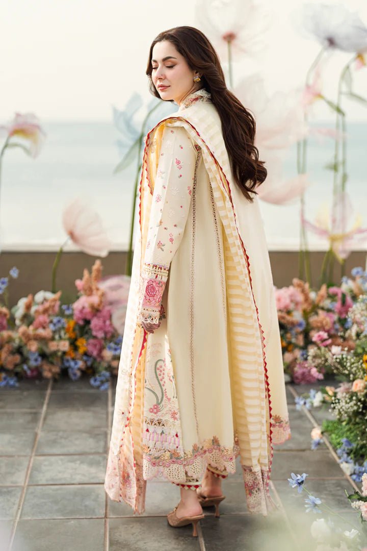 Model wearing cream FK - 14 SCARLETT dress from Qalamkar, a stylish Pakistani lawn suit perfect for summer clothes and lawn suits in the UK.