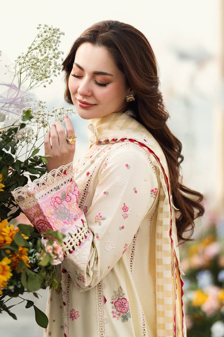 Model wearing cream FK - 14 SCARLETT dress from Qalamkar, a stylish Pakistani lawn suit perfect for summer clothes and lawn suits in the UK.