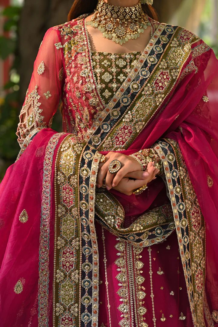 Model wearing Qalamkar Singhar Wedding Formals RF - 04 RIMEL dress in magenta, Pakistani wedding clothes online in UK.