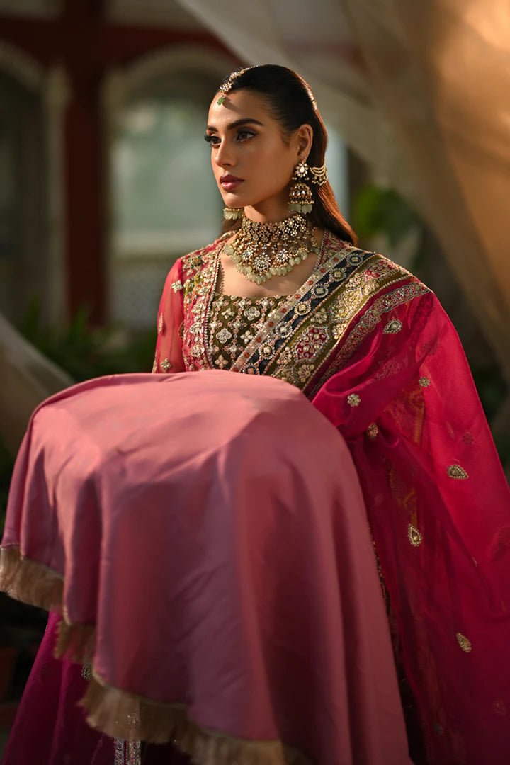 Model wearing Qalamkar Singhar Wedding Formals RF - 04 RIMEL dress in magenta, Pakistani wedding clothes online in UK.