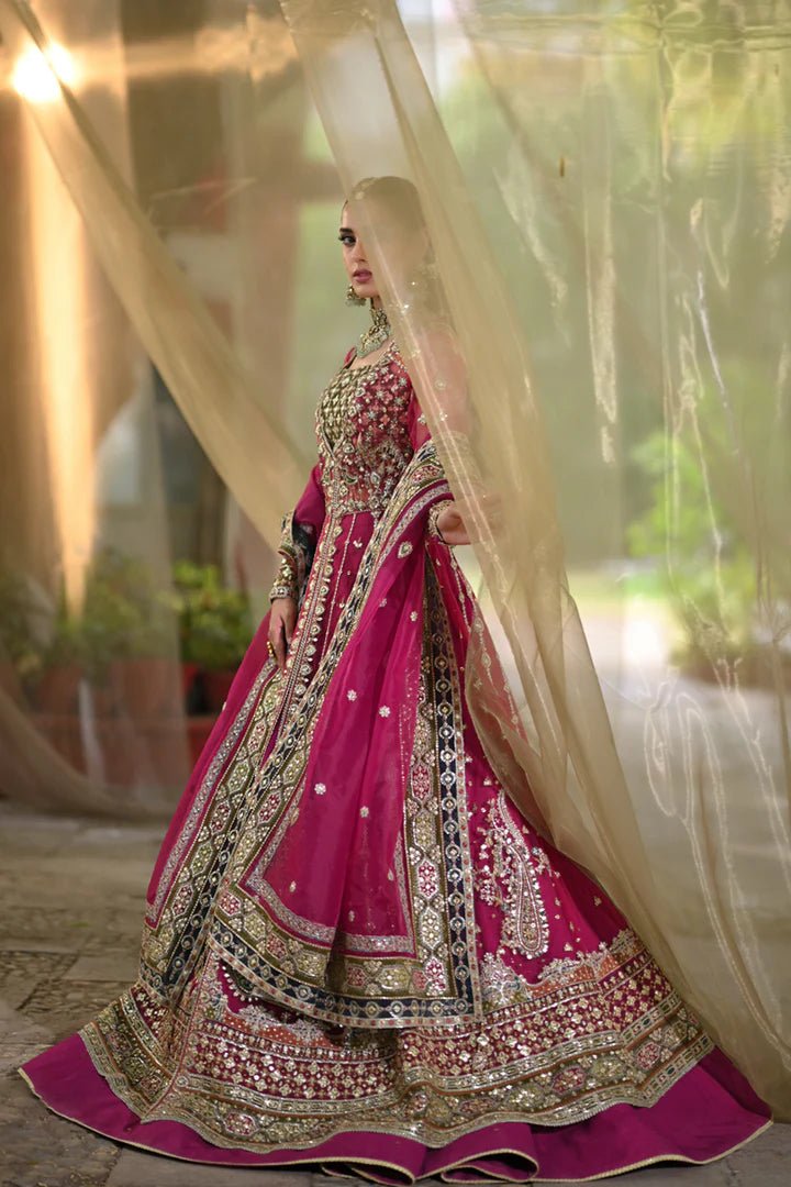 Model wearing Qalamkar Singhar Wedding Formals RF - 04 RIMEL dress in magenta, Pakistani wedding clothes online in UK.