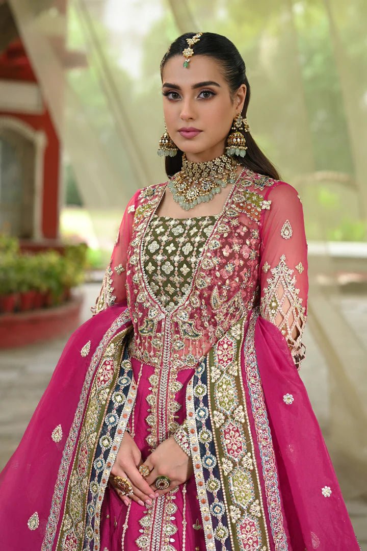 Model wearing Qalamkar Singhar Wedding Formals RF - 04 RIMEL dress in magenta, Pakistani wedding clothes online in UK.